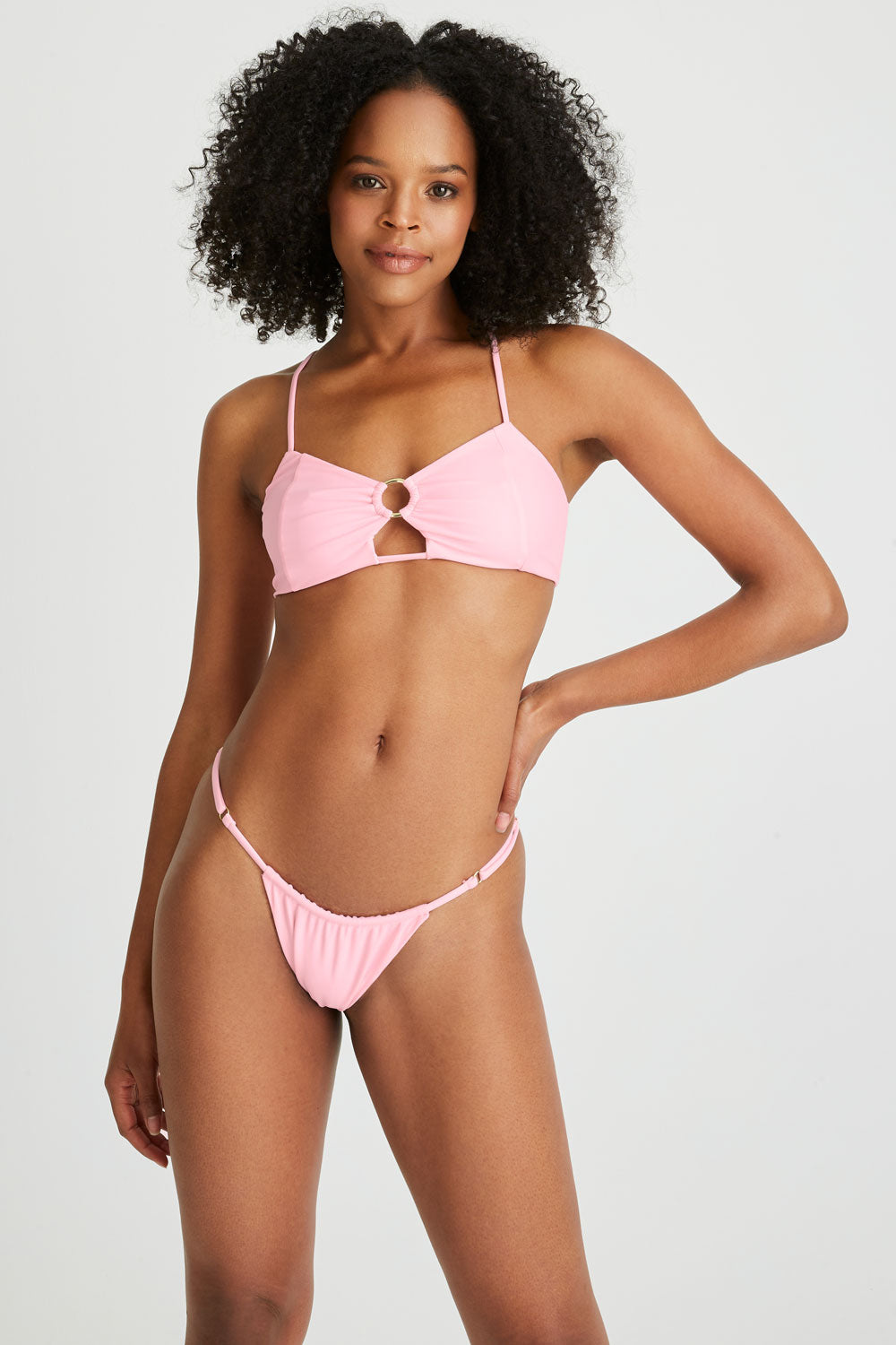 Bikini babe model wearing one of our pink bikini sets